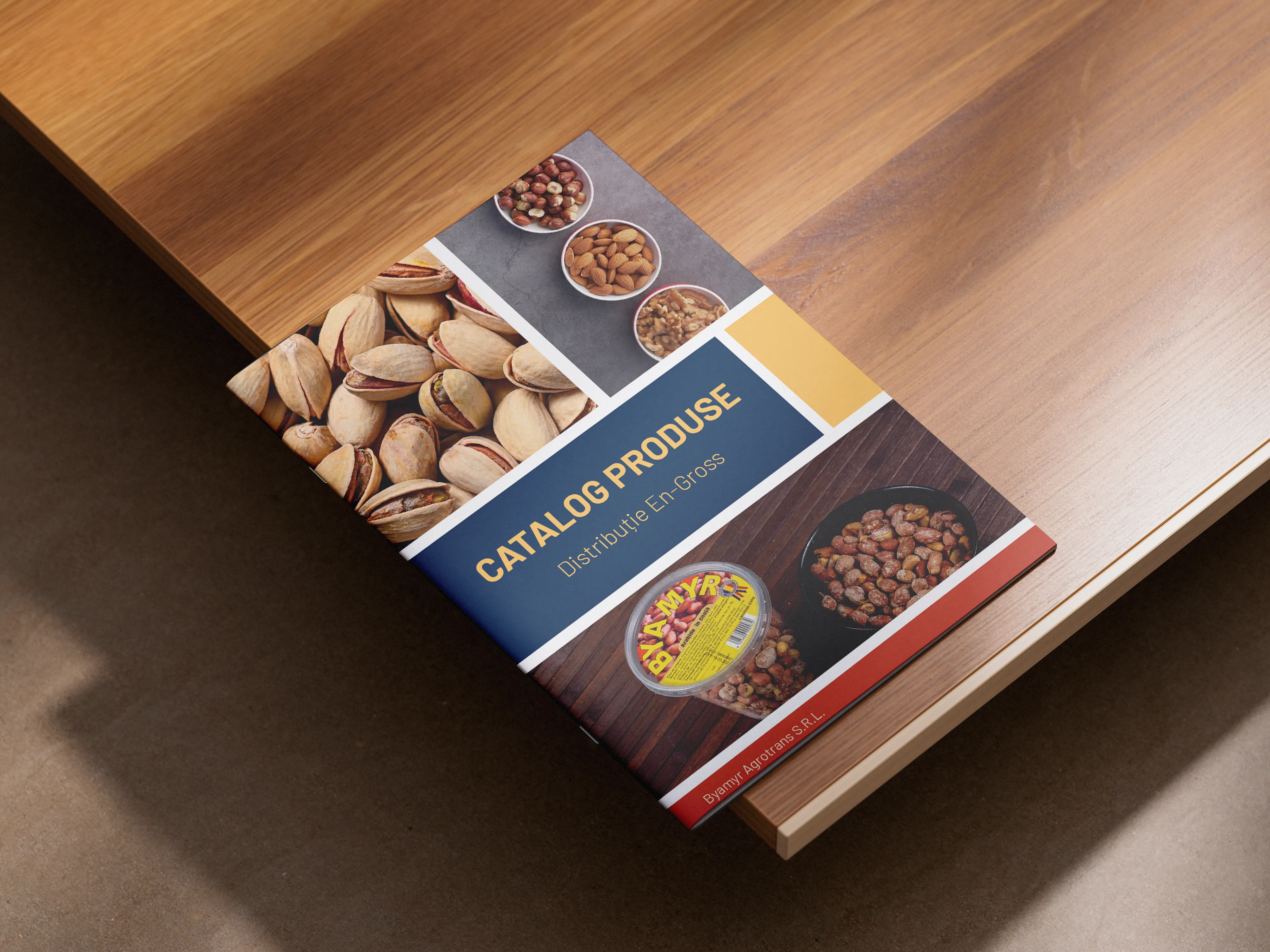 Mockup catalog Byamyr coperta fata pe masa